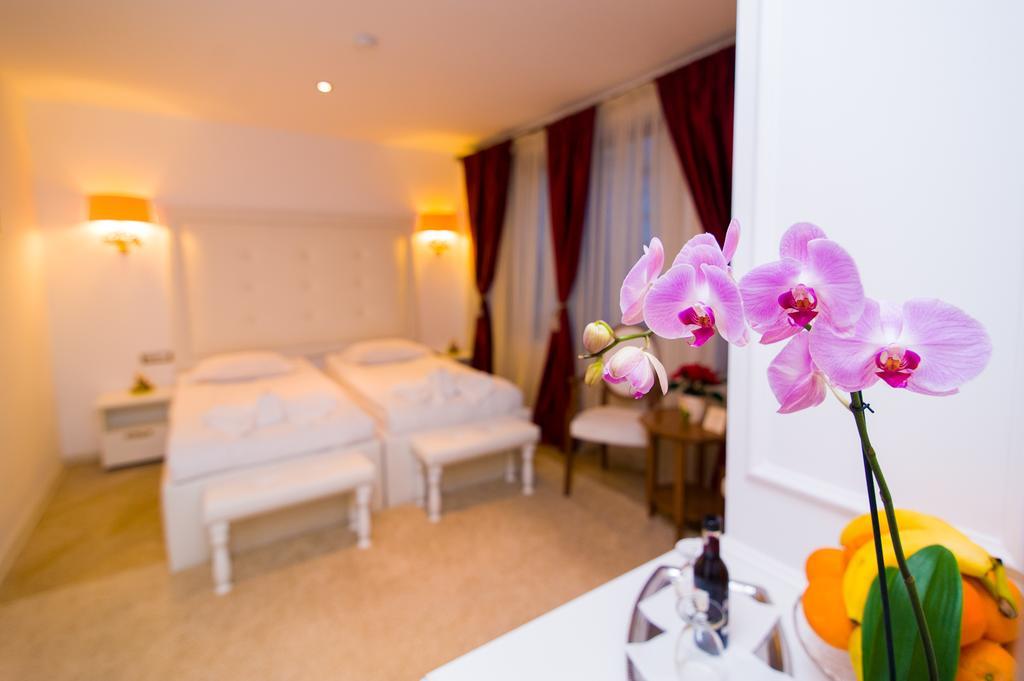 Hotel Dbh Bucarest Habitación foto